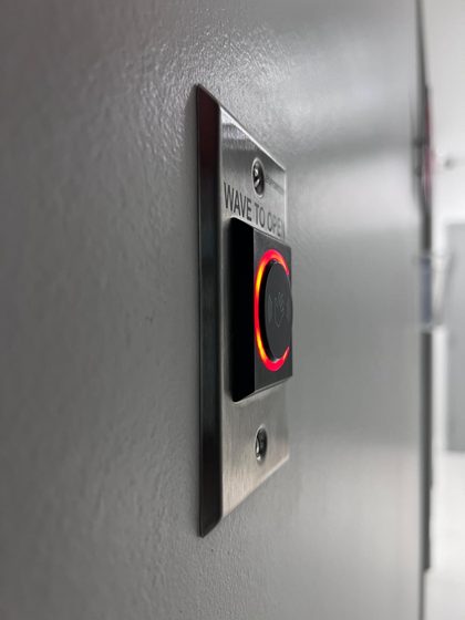 Touchless exit button that opens the door with a wave of the hand