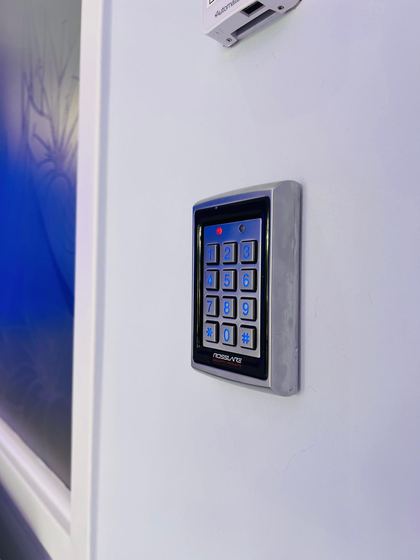 Rosslare access control keypad next to a door