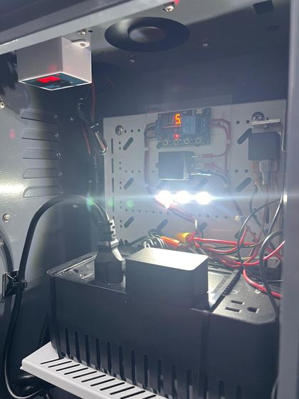 Cabinet with UPS, temperature control and timer